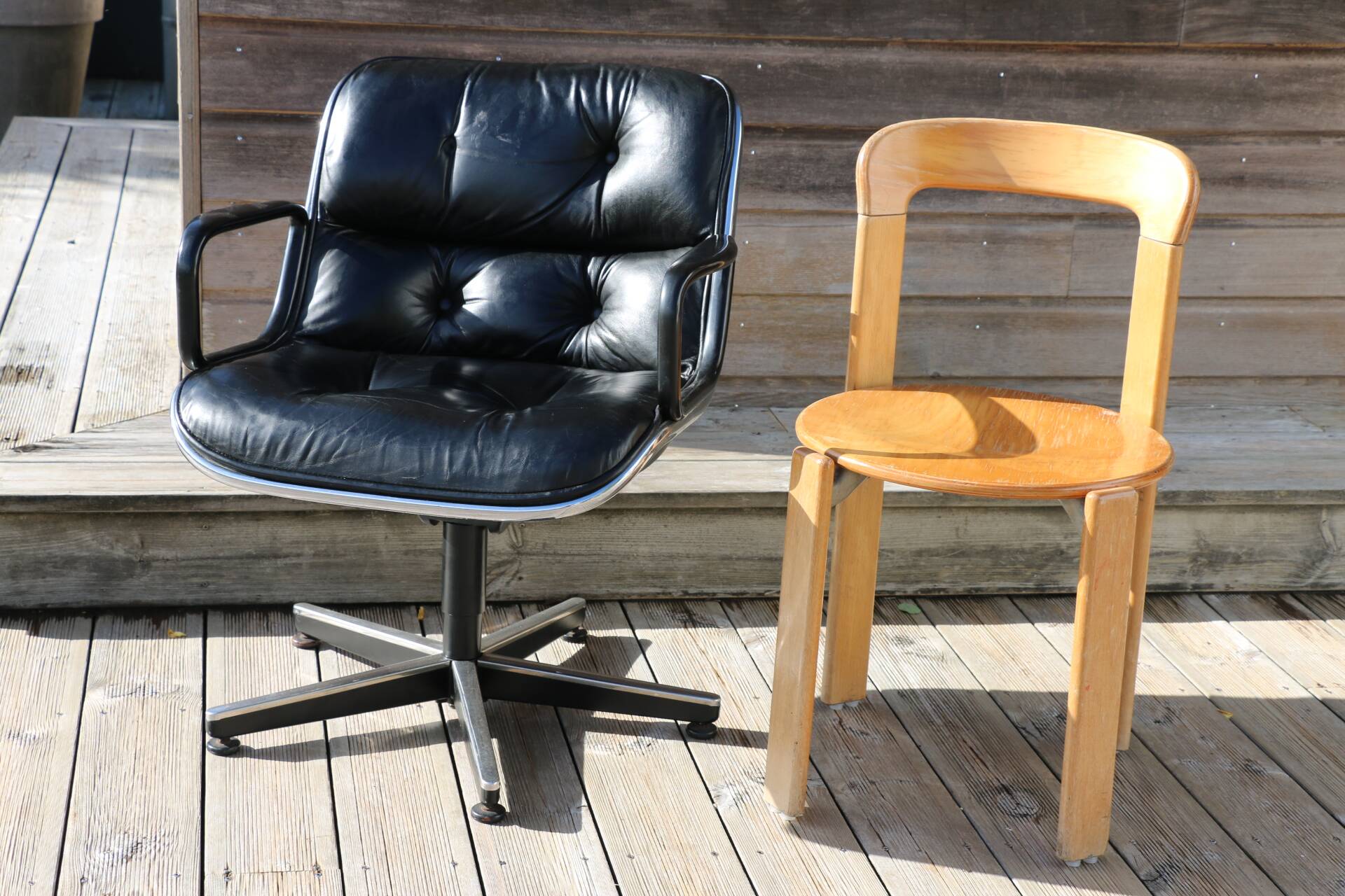 Pollock black leather reclining armchair with fixed ends