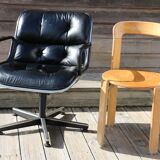 Pollock black leather reclining armchair with fixed ends