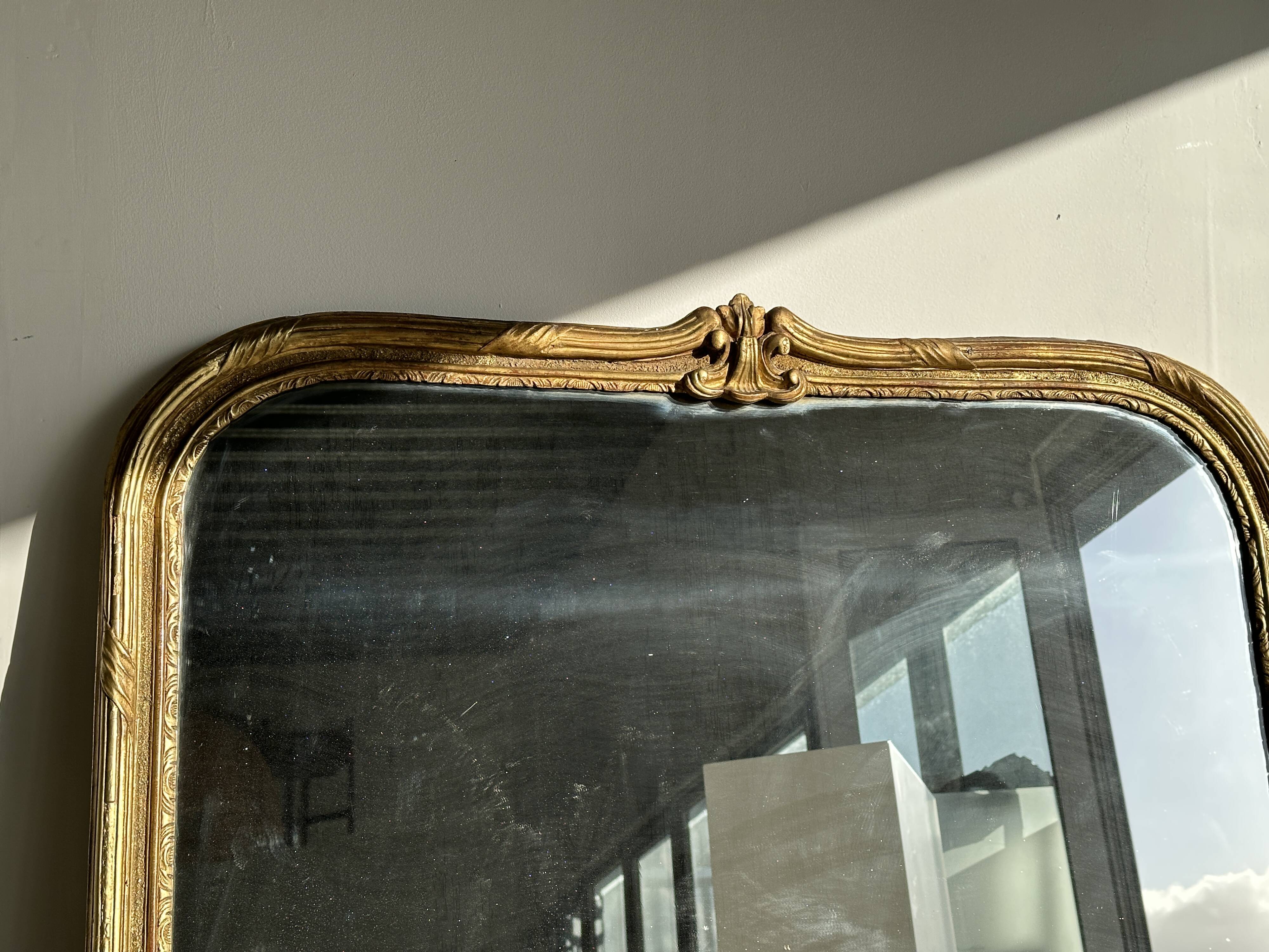 Large gilded mirror 19th century rounded corners mercury glass Louis XVI style