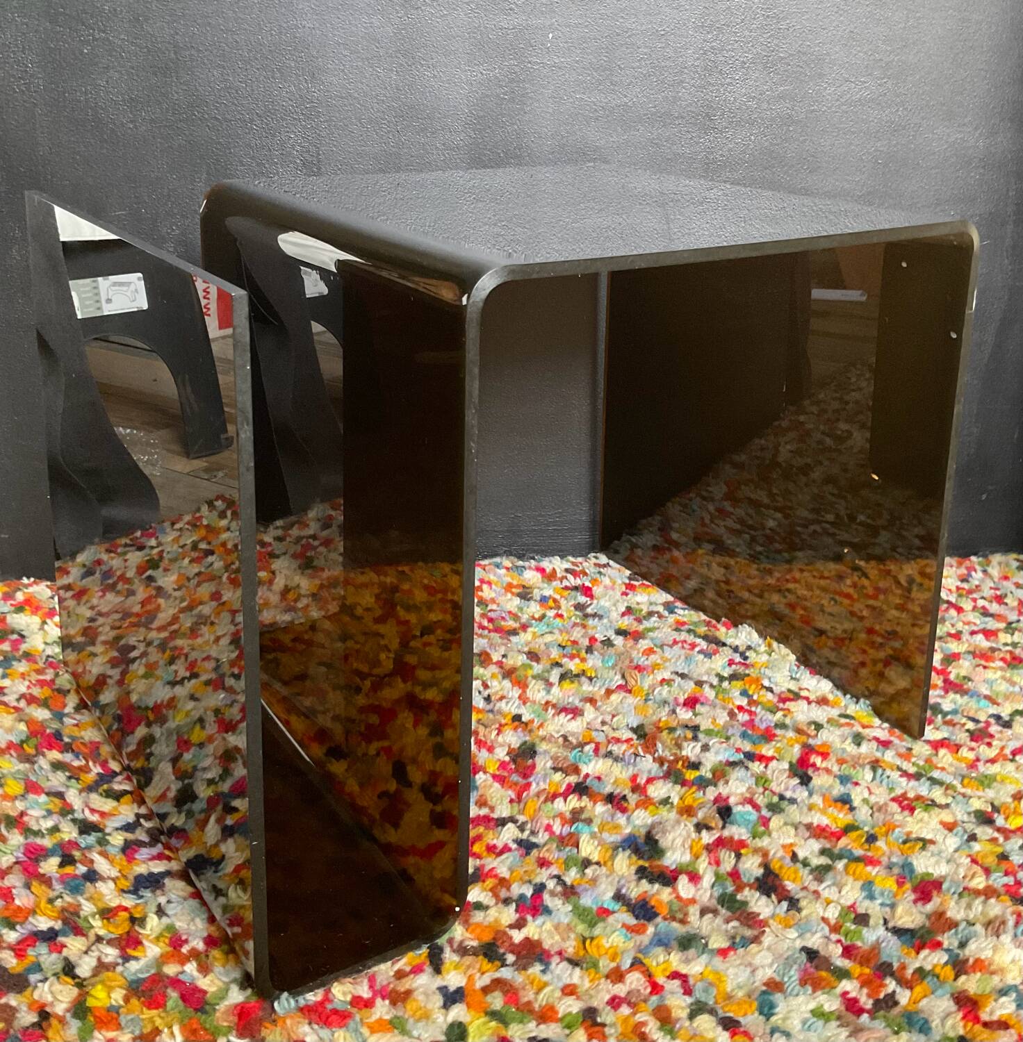 Smoked plexiglass magazine rack side table from the 70s