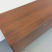 Vintage modernist enfilade in rosewood and chrome metal from the 60s and 70s.