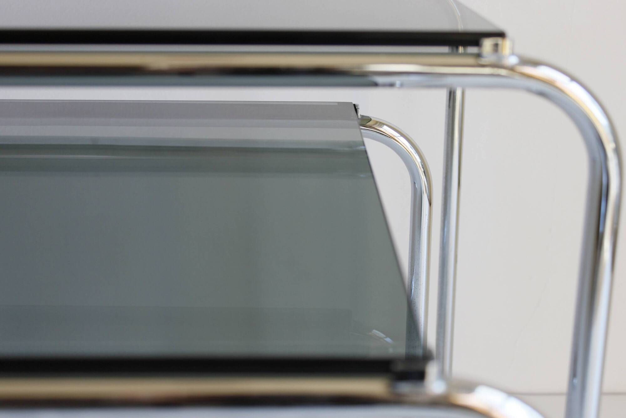 Tubular steel and smoked glass side tables, set of 2