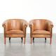 Set of two vintage sheepskin club armchairs with a beautiful light colour