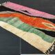 Large handmade Moroccan rug with colourful patterns.