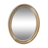 Oval-shaped wooden mirror