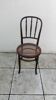 Old caned bistro chair fischel