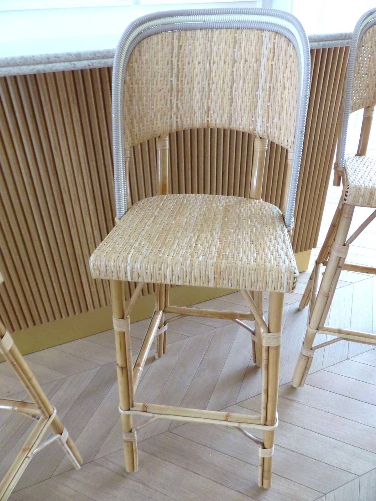 Lot of 3 Maison Louis Drucker light Manila rattan bistro high chairs.