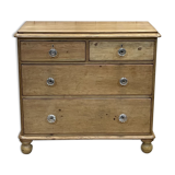 English chest of drawers in nineteenth century fir with its glass buttons