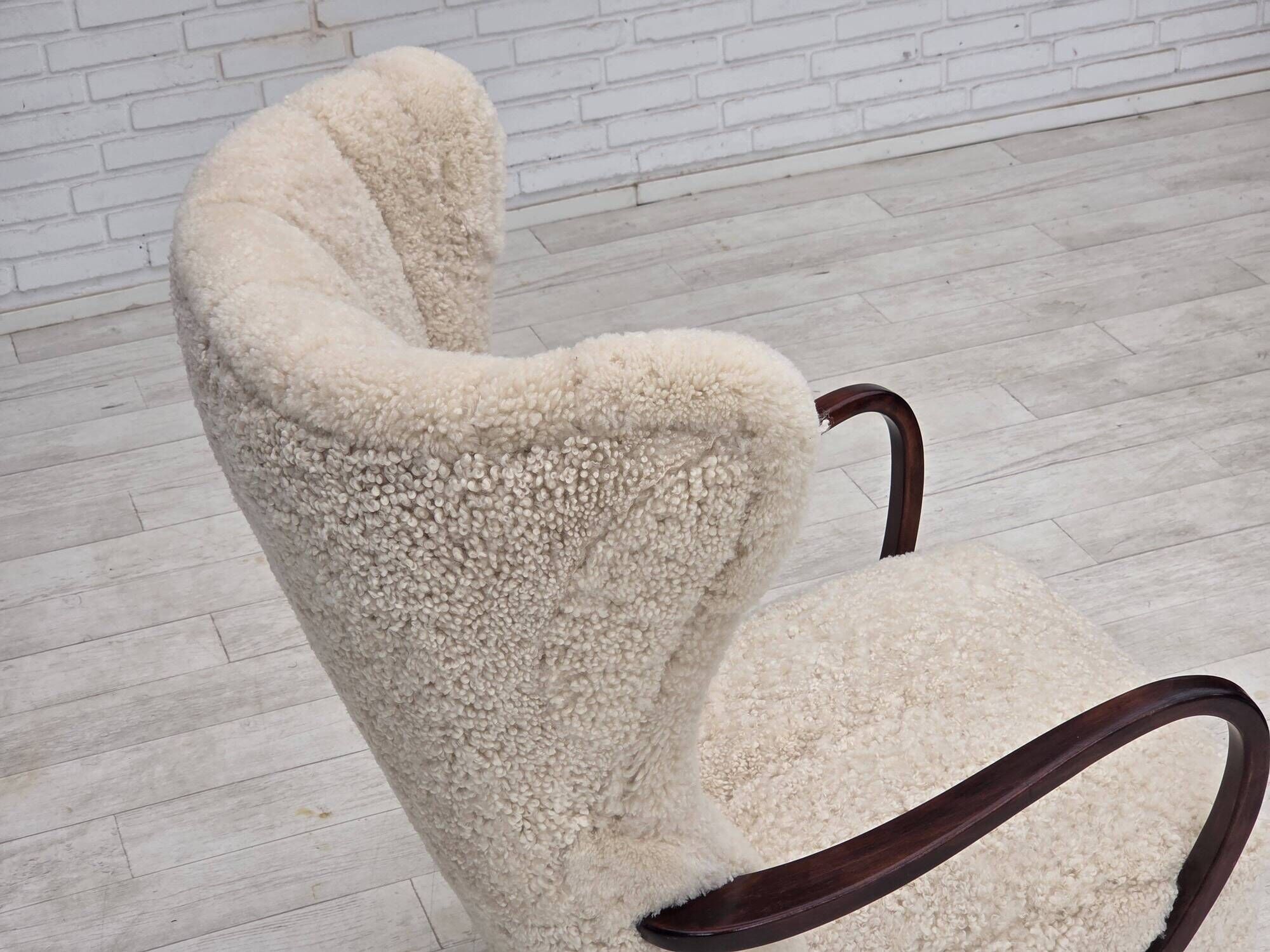 1960s, Danish high-back armchair, genuine sheepskin, reupholstered.