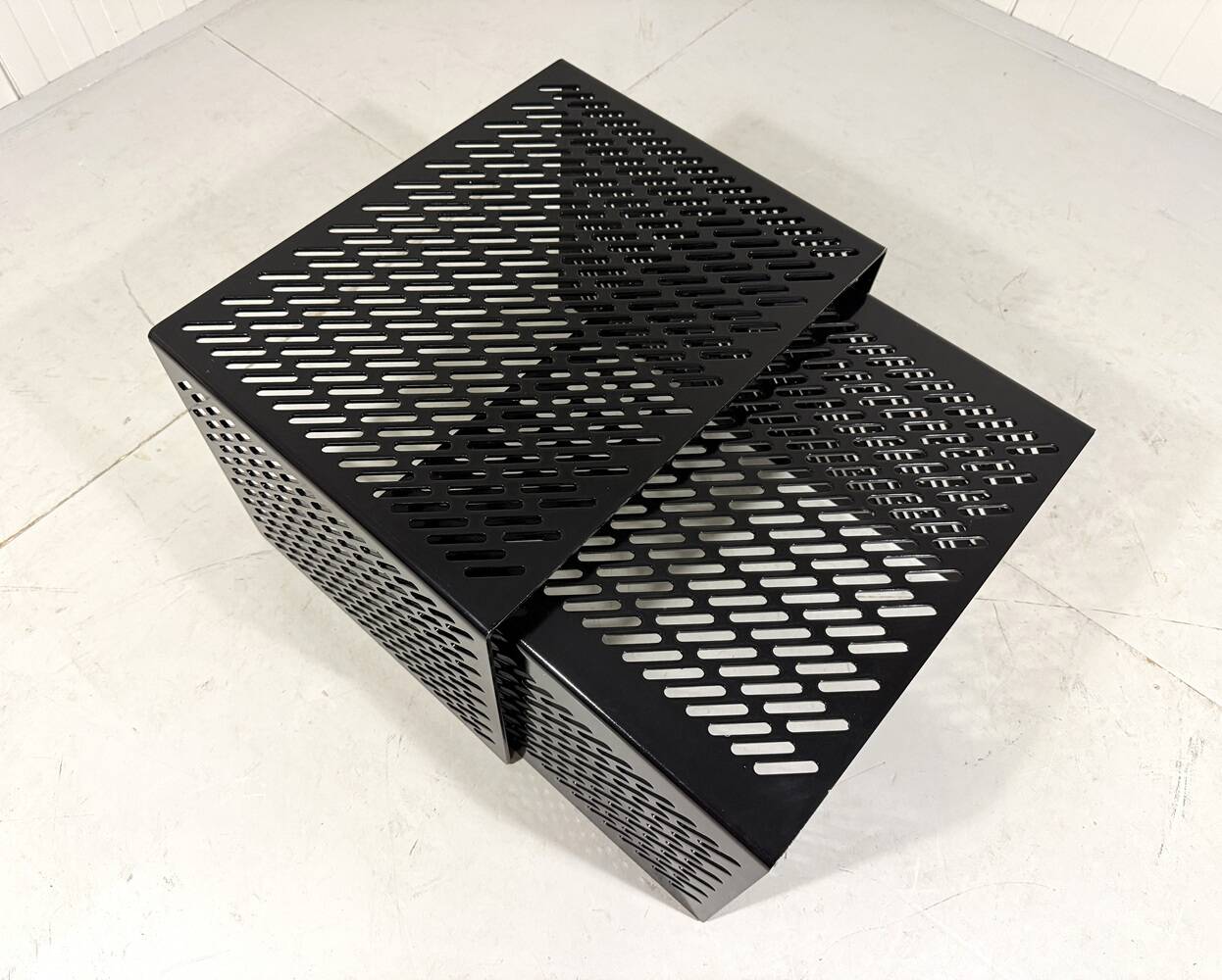 Black perforated steel nesting tables Italy 1980’s