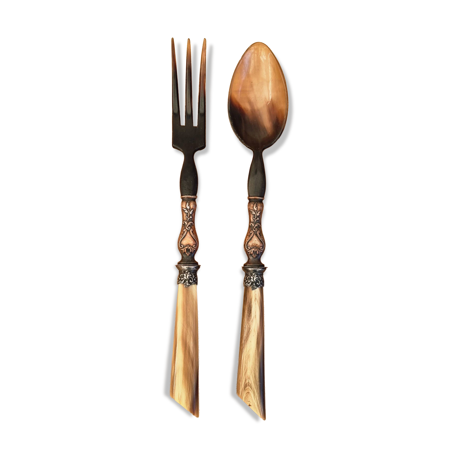 Vintage serving cutlery in horn and wrought metal