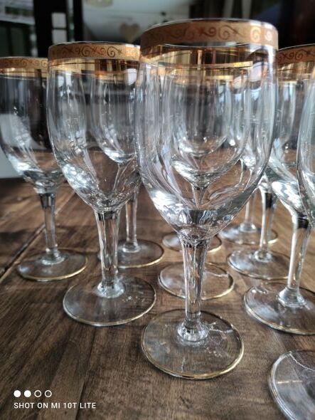 Set of 9 water or red wine glasses in crystal curled and gilded edging