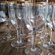 Set of 9 water or red wine glasses in crystal curled and gilded edging