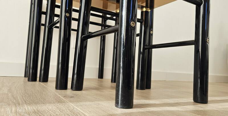 Set of 3 vintage nesting tables in smoked glass and black metal – 1970s