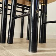 Set of 3 vintage nesting tables in smoked glass and black metal – 1970s