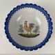 Regional earthenware small hollow dish decorated with 20th century rooster