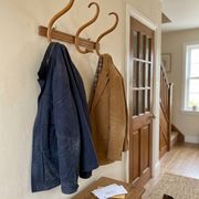 Curved wooden coat rack with 3 hooks, 1920s.