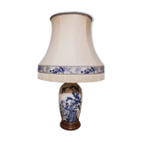 Ceramic lamp with Asian decoration with matching lampshade.