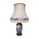 Ceramic lamp with Asian decoration with matching lampshade.
