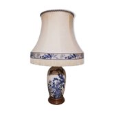 Ceramic lamp with Asian decoration with matching lampshade.