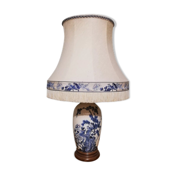 Ceramic lamp with Asian decoration with matching lampshade.