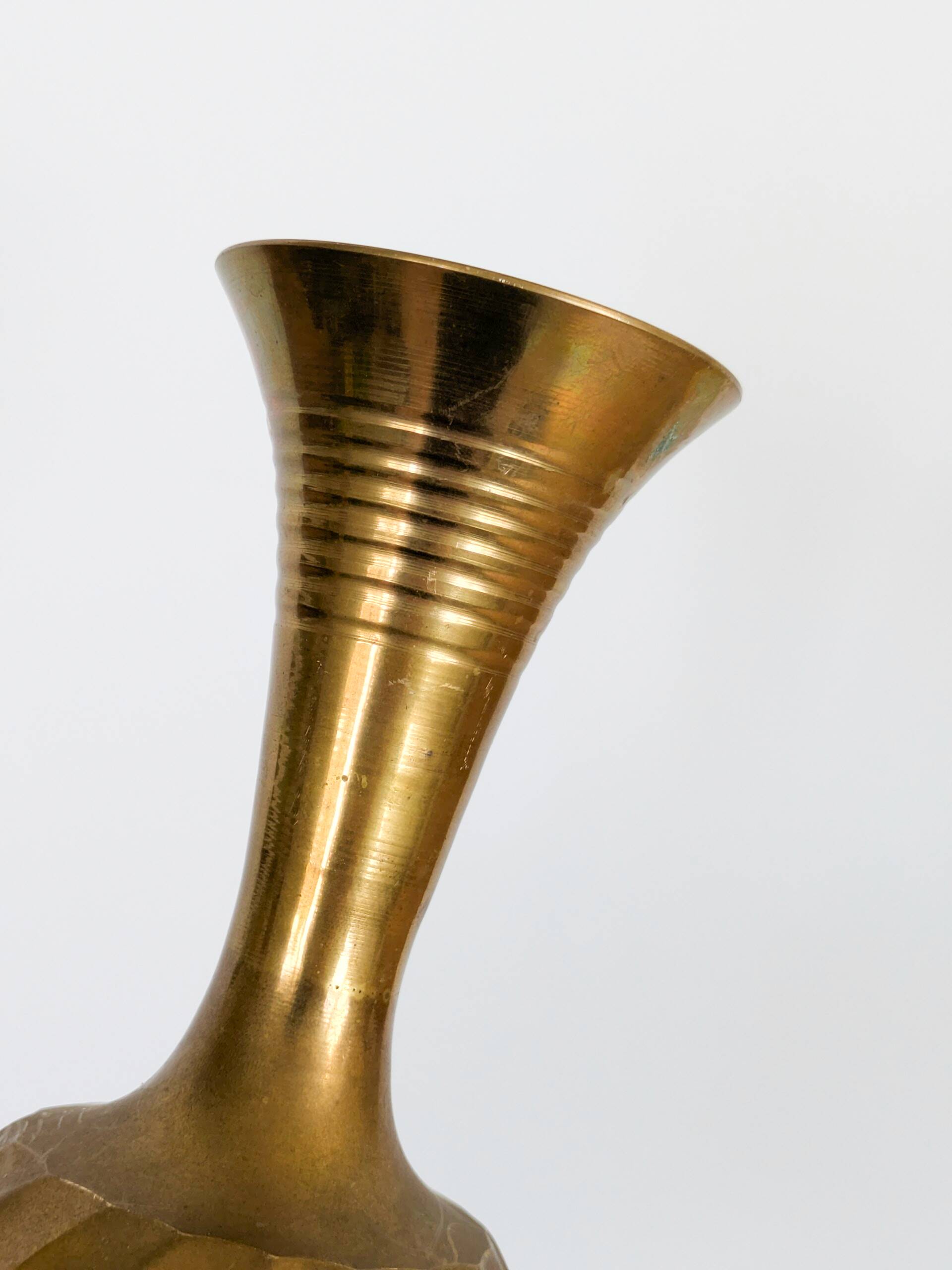 Solid brass Midcentury vase in trumpet shape with twisted details.