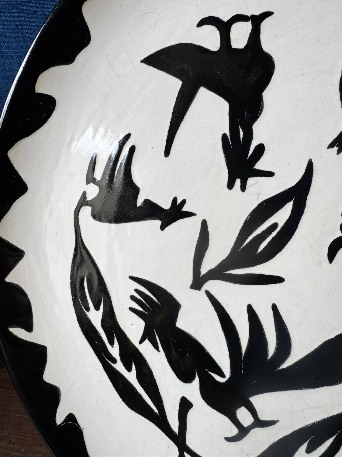 Large ceramic plate J. Lurçat with zoomorphic decoration in black on a white background.