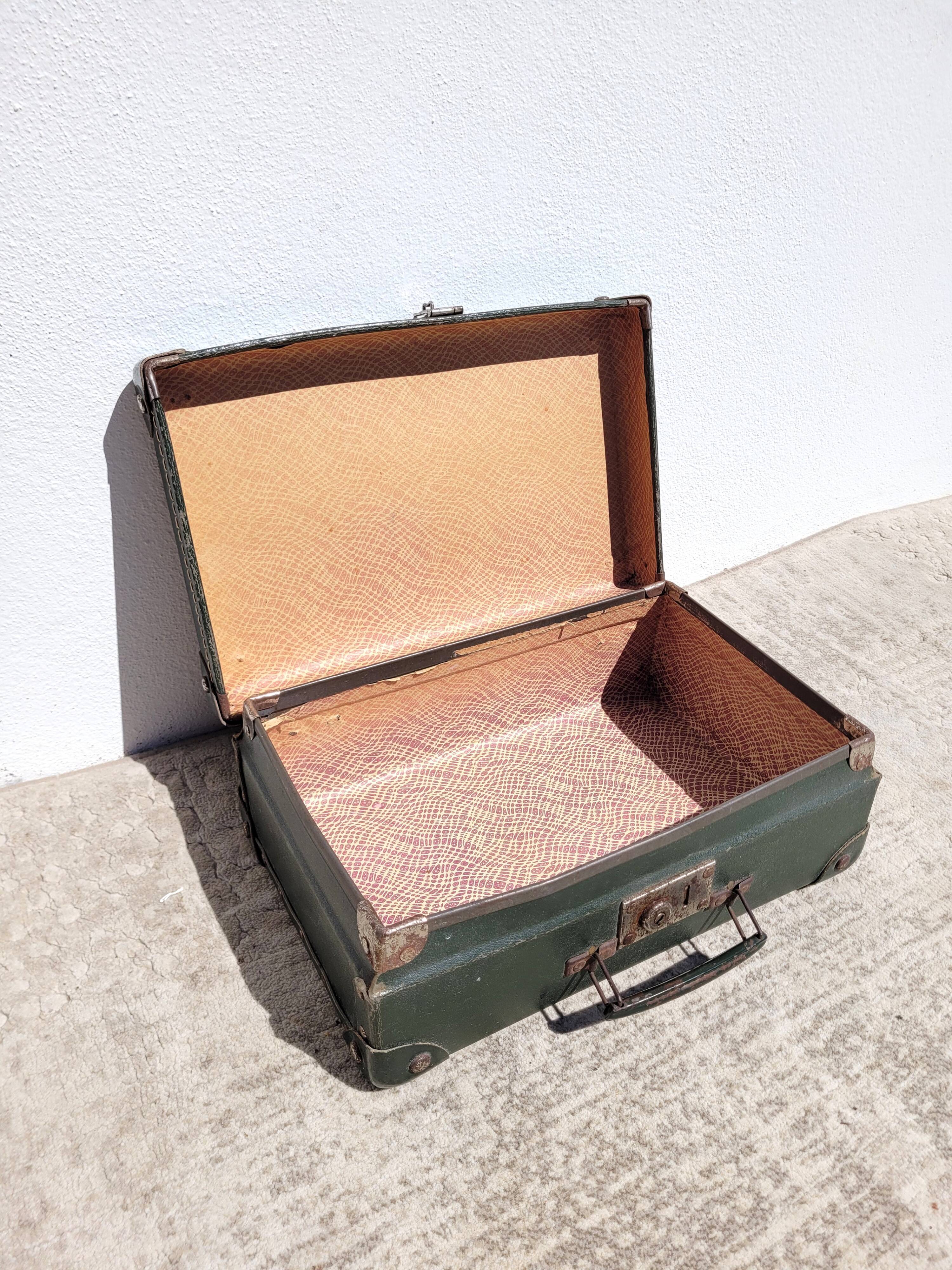 Old English green suitcase