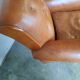 Ancien fauteuil club en cuir, vers 1940 style art déco
