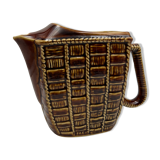 Ceramic pitcher with braided effect