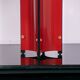 Red metal sculptural table lamp with oversized lamp shade circa 1980