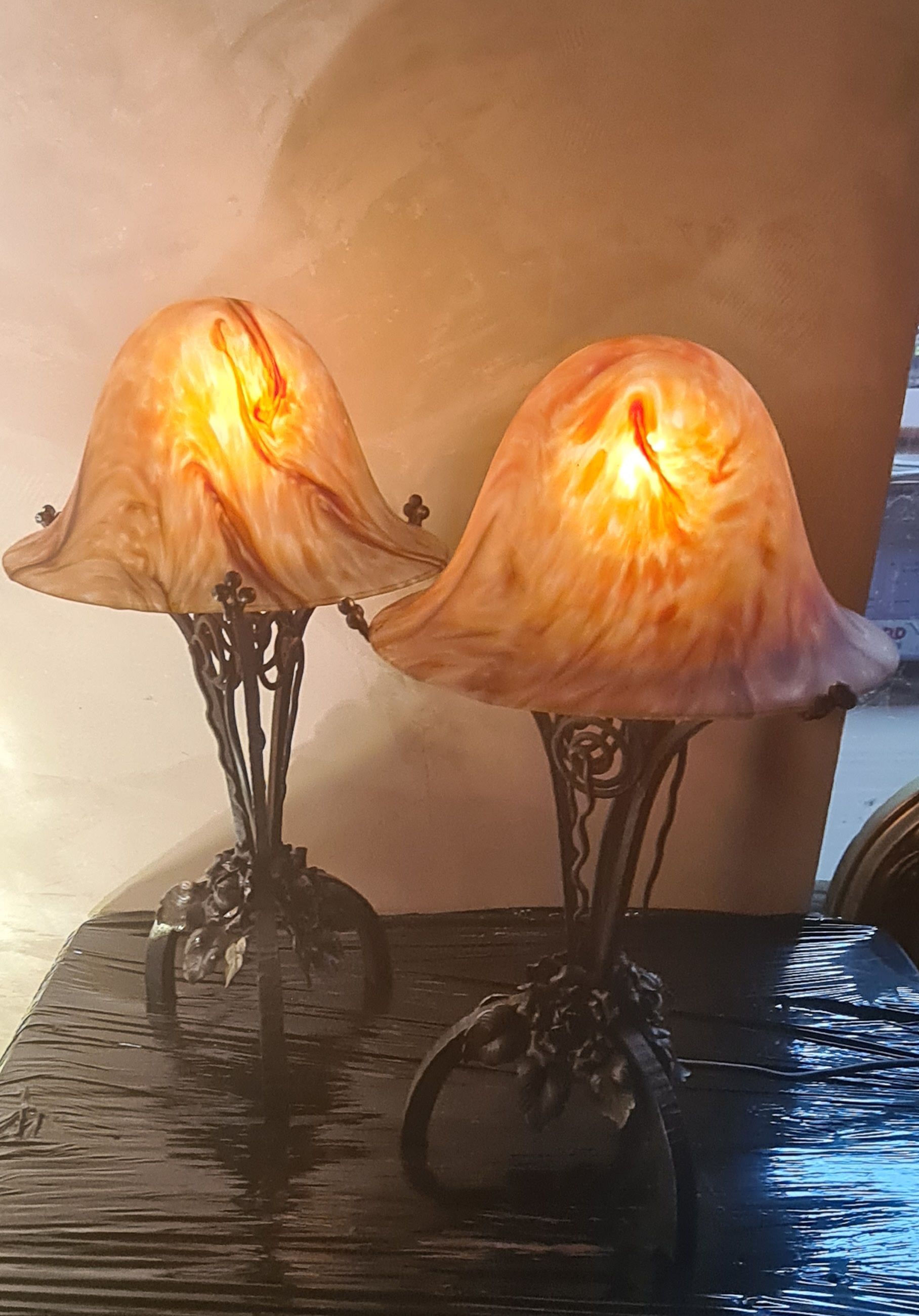 Pair of art nouveau wrought iron lamps with marbled glass paste 42x25