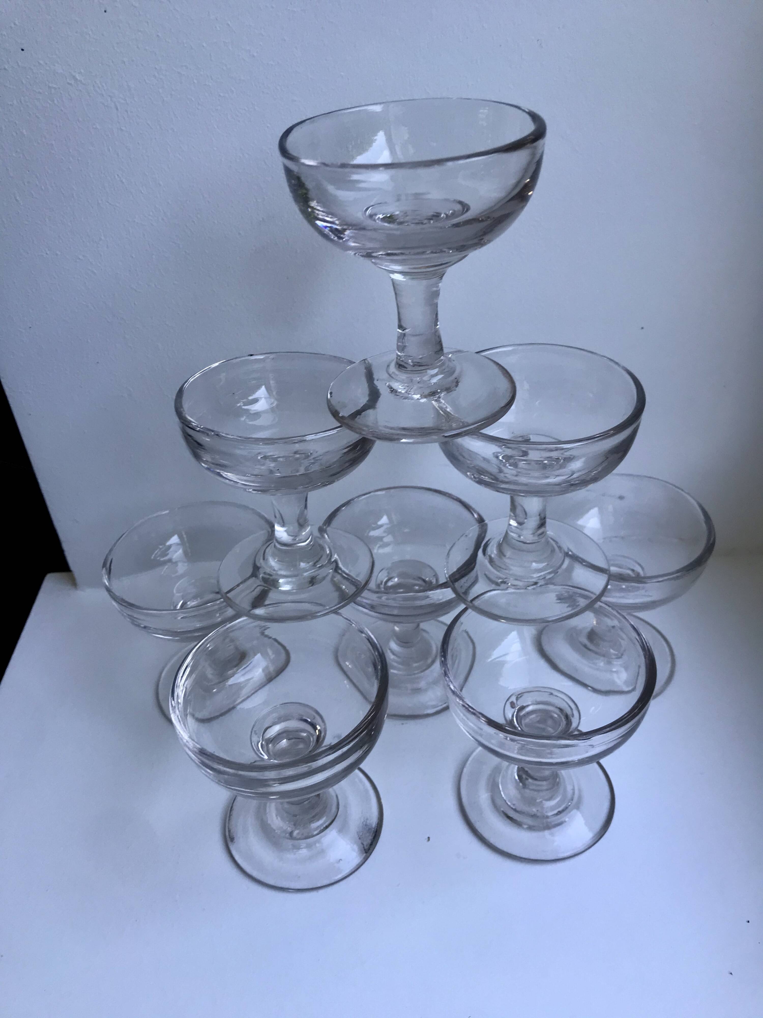 set of 9 small molded glass shot glasses early twentieth century