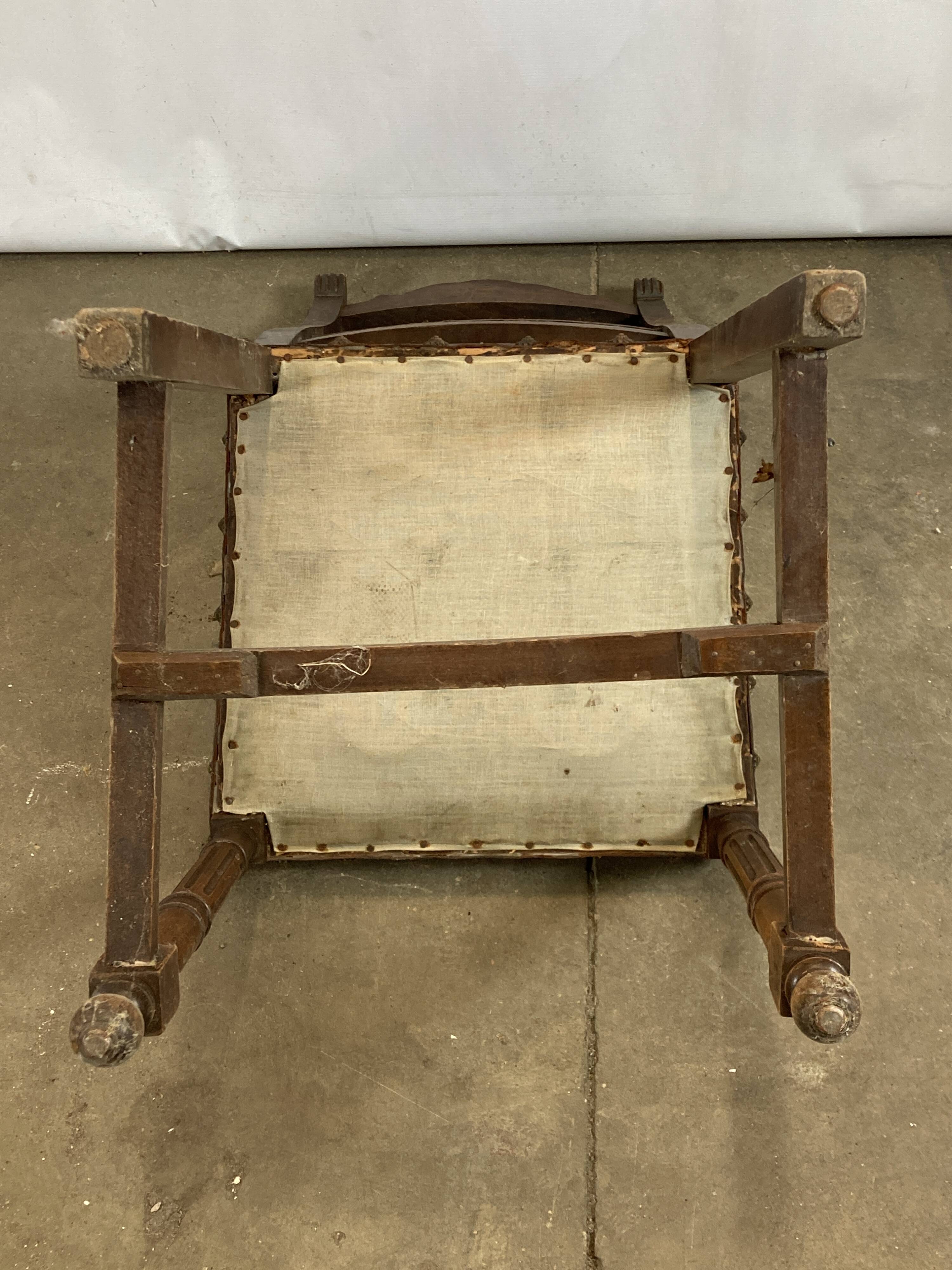 Pair of Henry II wooden and leather chairs