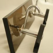 Brown smoked glass coat hook from the 1970s.