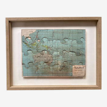 Old framed geographic puzzle Oceania