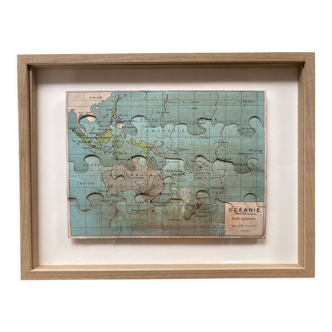 Old framed geographic puzzle Oceania