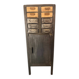 Industrial furniture made of iron and wood with drawers.