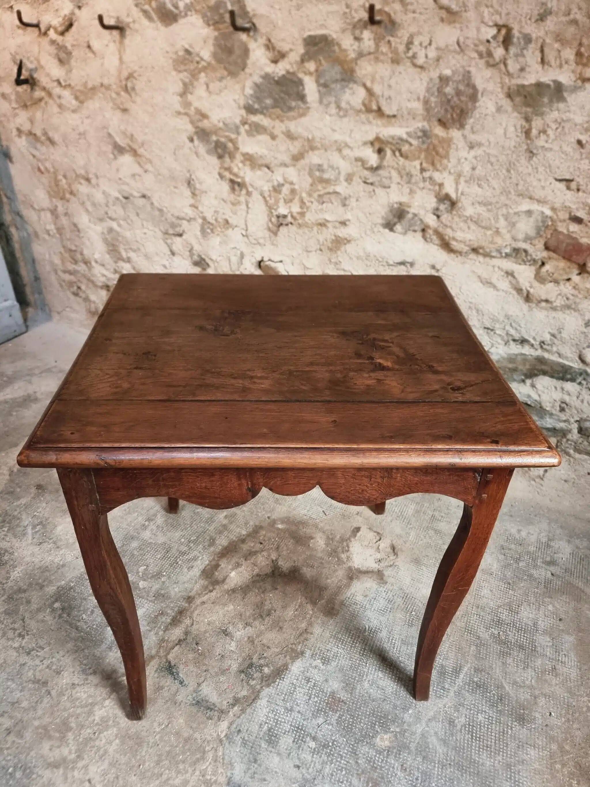 Antique oak side table, provincial writing table from the 18th century, Louis XV style.