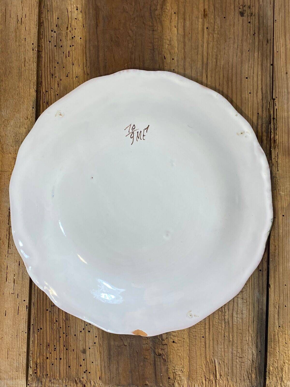 Set of 6 earthenware plates from Moustiers, featuring birds and flowers.