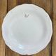 Set of 6 earthenware plates from Moustiers, featuring birds and flowers.