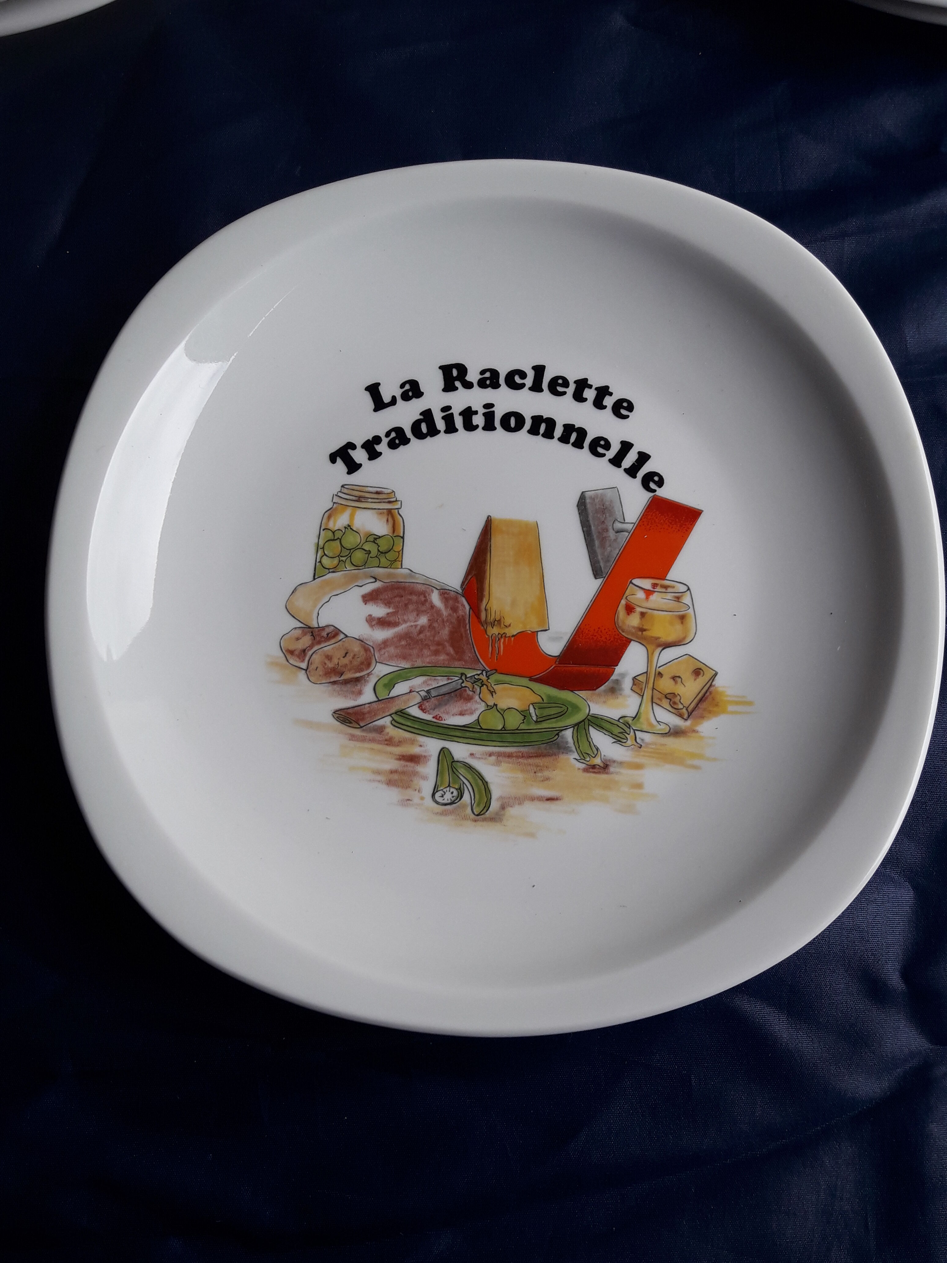 Lourioux porcelain raclette service created by Philippe Deshoulières