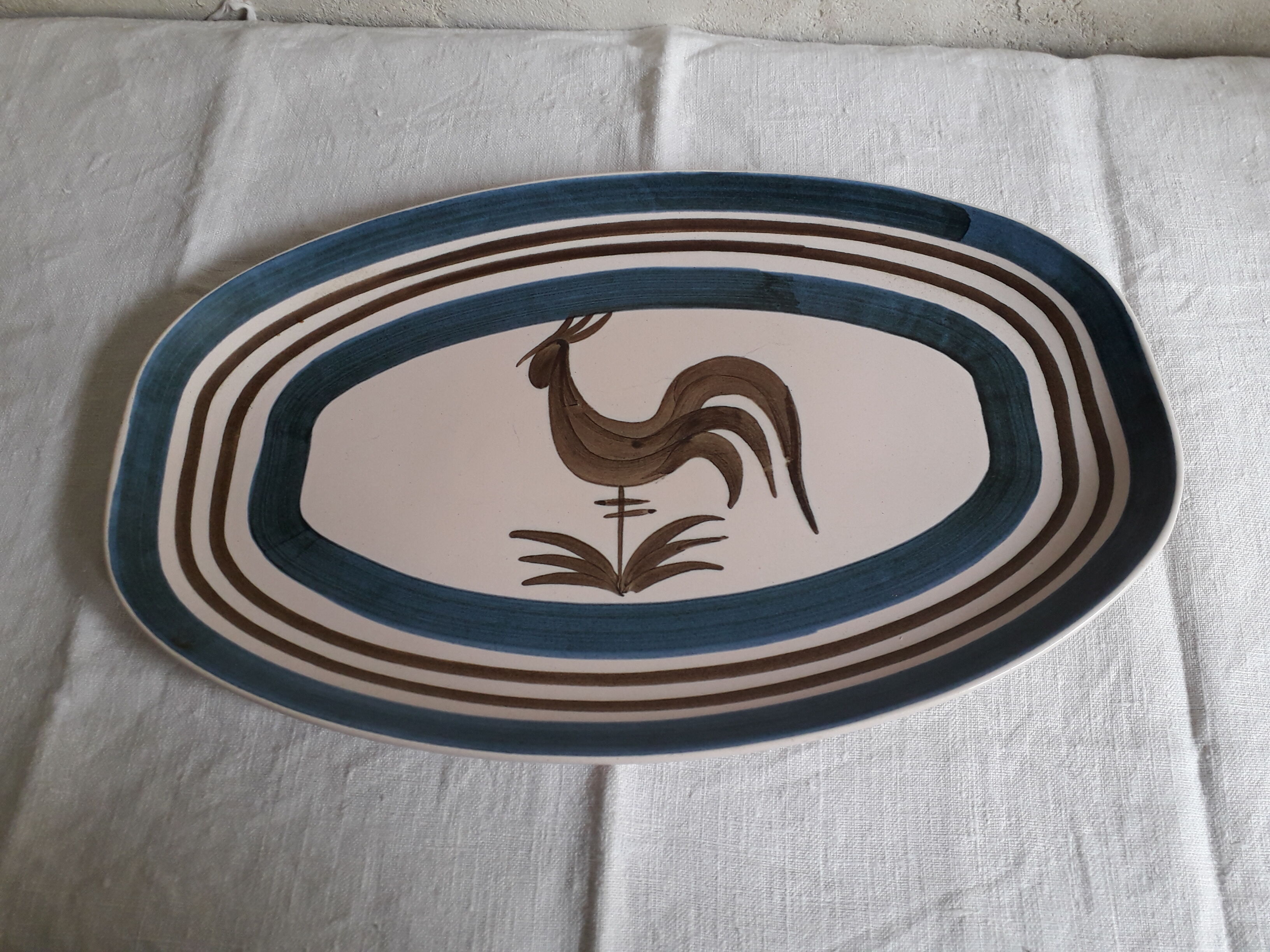 Longchamp sandstone dish with 70s rooster decorations