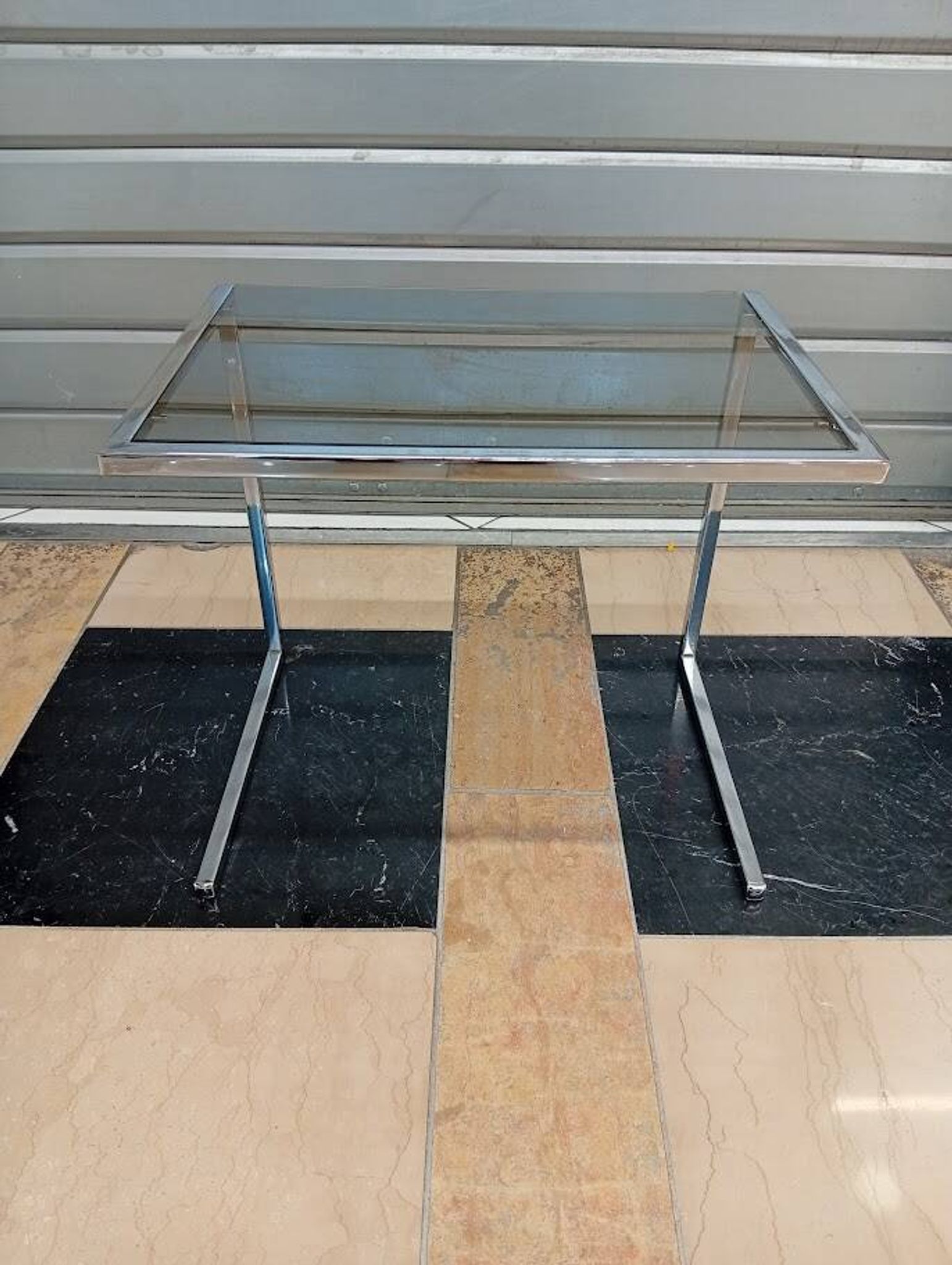 Vintage glass and chrome side table