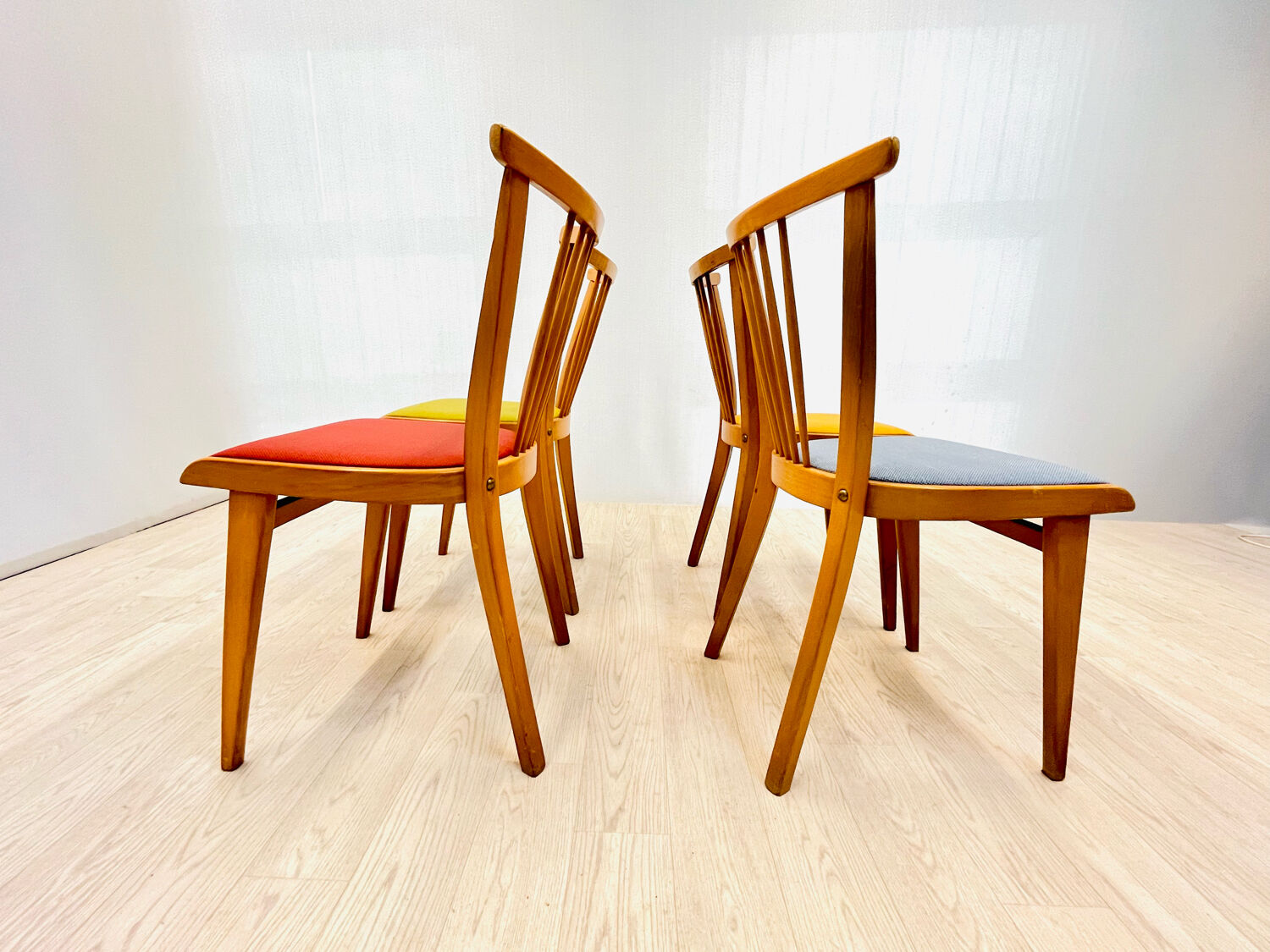 Four colourful chairs