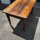 Old wooden table with a drawer