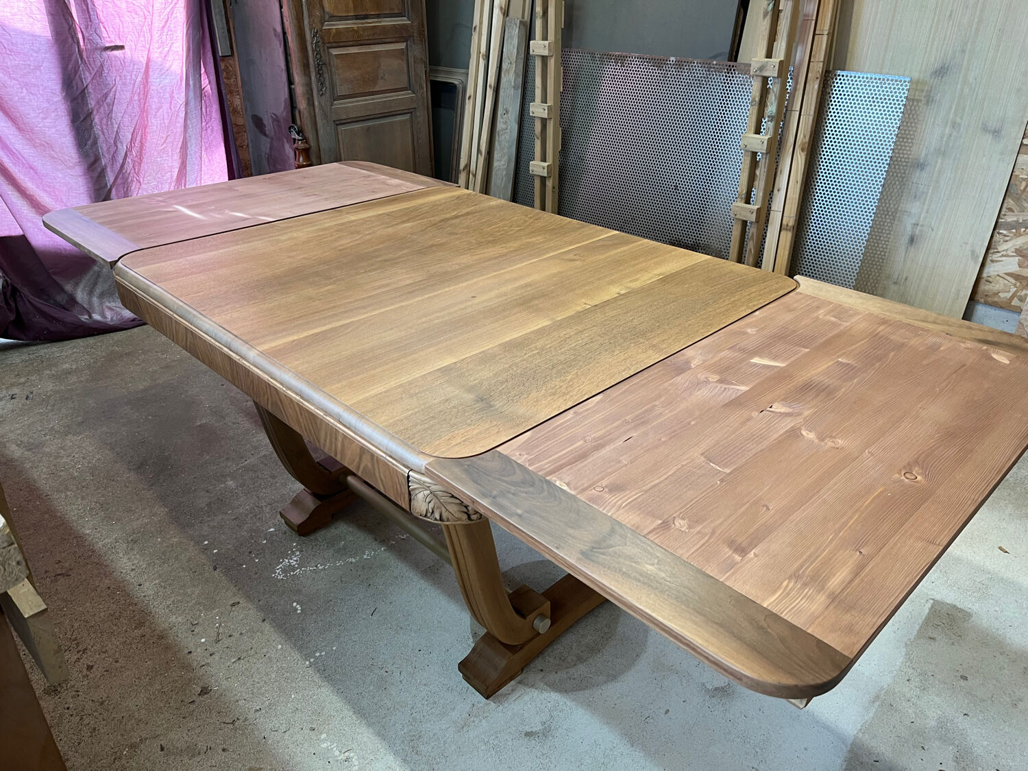 Art Deco table with extensions.