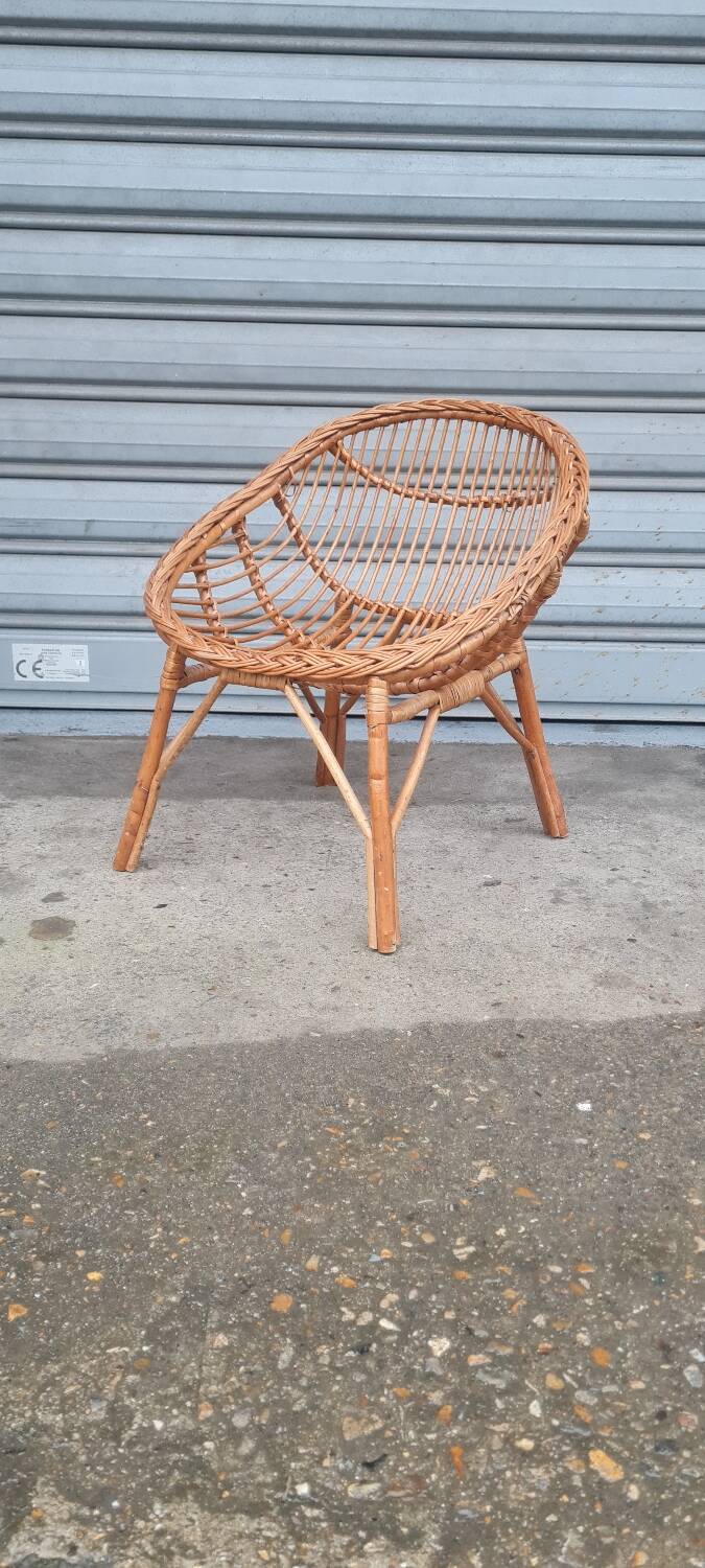 Fauteuil coquille en rotin