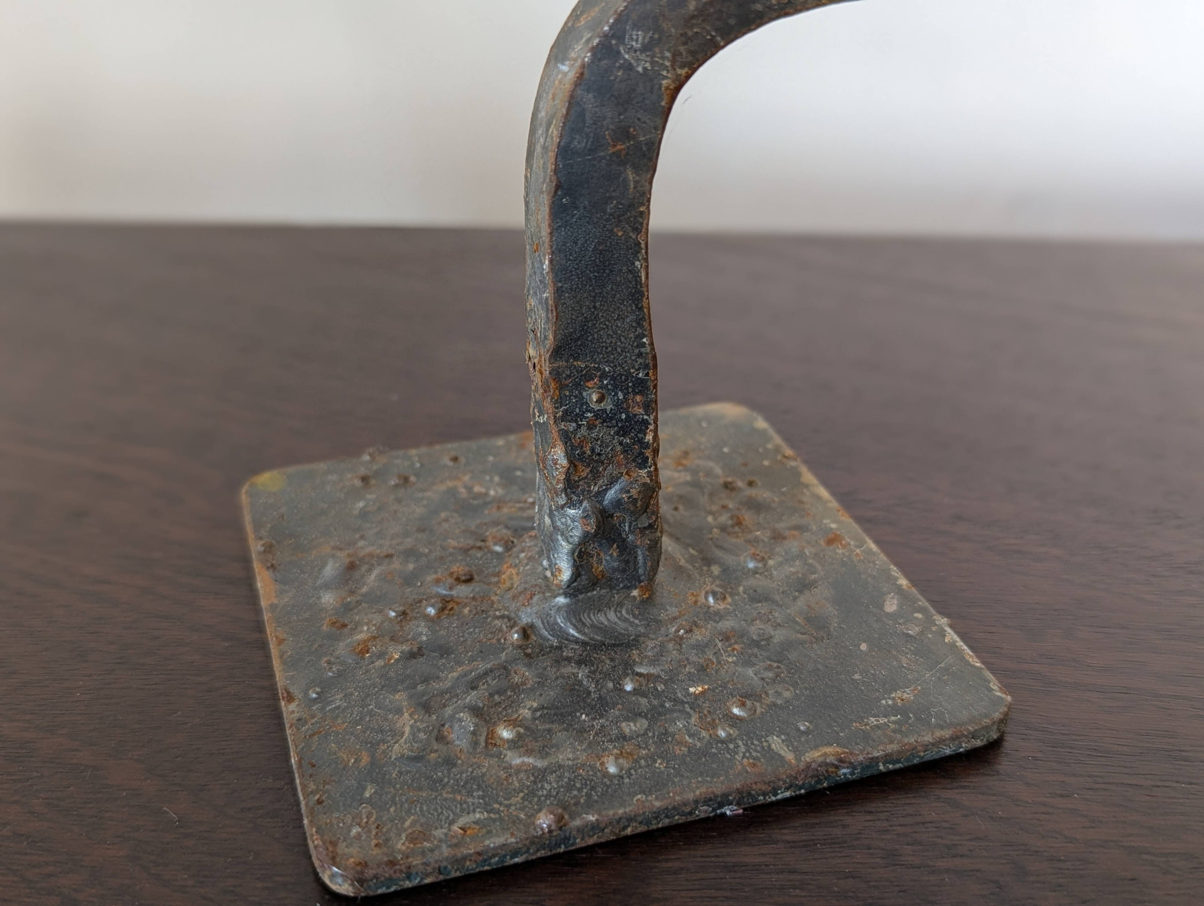 Pair of wrought iron candlesticks