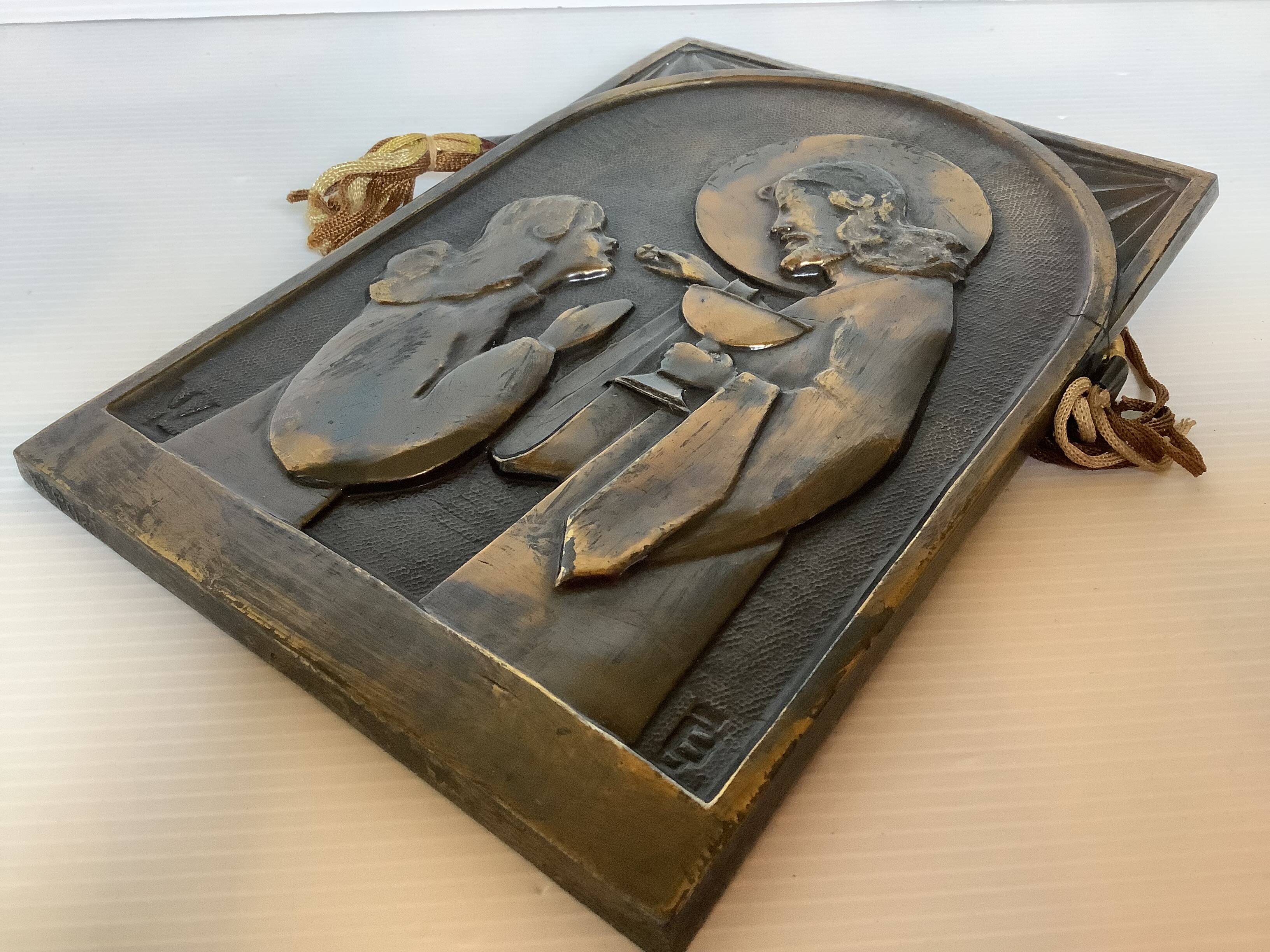 Bas-relief of communion religious object